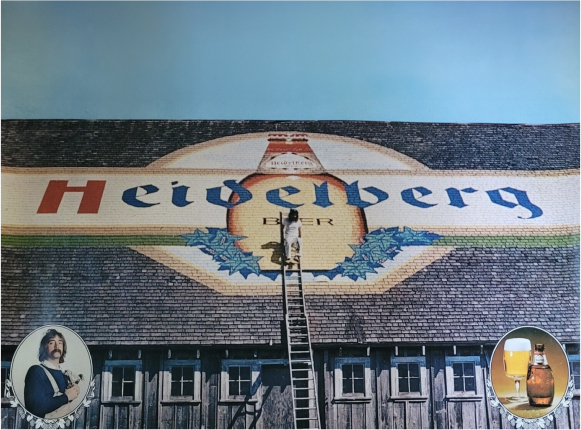 Image of a Heidelberg logo on top of a building's roof.